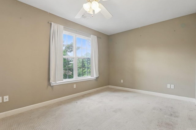 7106 Ohio St Unit 6, Little Rock, AR 72207 - empty room featuring baseboards, carpet floors, and ceiling fan