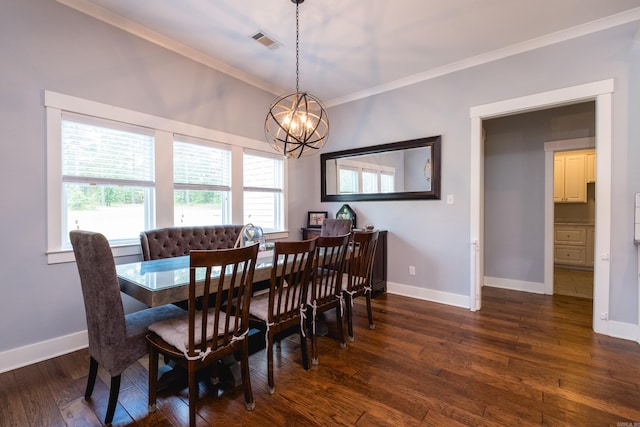 853 Rushing Rd, Little Rock, AR 72210 - dining space featuring ornamental molding, a chandelier, dark wood-style flooring, and baseboards