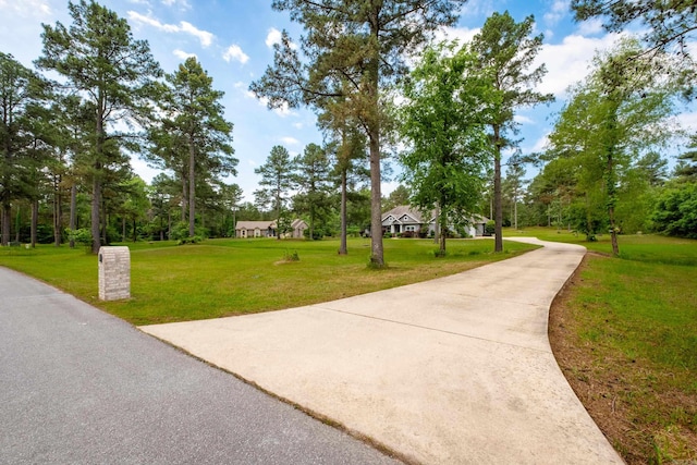 853 Rushing Rd, Little Rock, AR 72210 - view of community with driveway and a yard