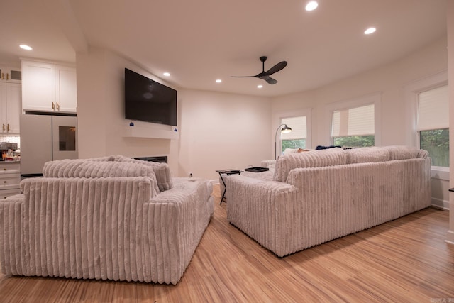 2103 Wolfe St, Little Rock, AR 72202 - living area featuring ceiling fan, light wood-style flooring, recessed lighting, and a fireplace