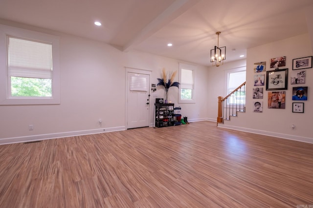 2103 Wolfe St, Little Rock, AR 72202 - living area featuring stairway, light wood-style floors, recessed lighting, a chandelier, and baseboards