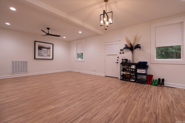 2103 Wolfe St, Little Rock, AR 72202 - unfurnished living room featuring recessed lighting, light wood-style floors, a chandelier, baseboards, and a ceiling fan