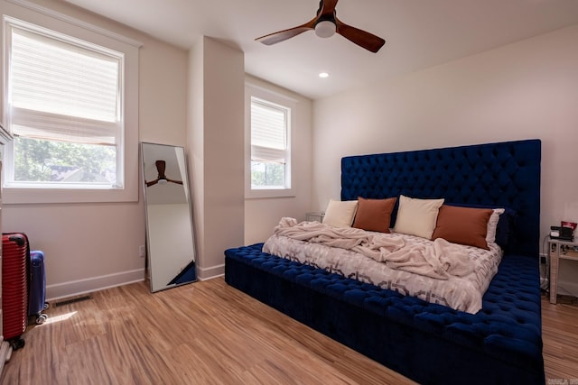 2103 Wolfe St, Little Rock, AR 72202 - bedroom with wood finished floors, baseboards, a ceiling fan, and recessed lighting