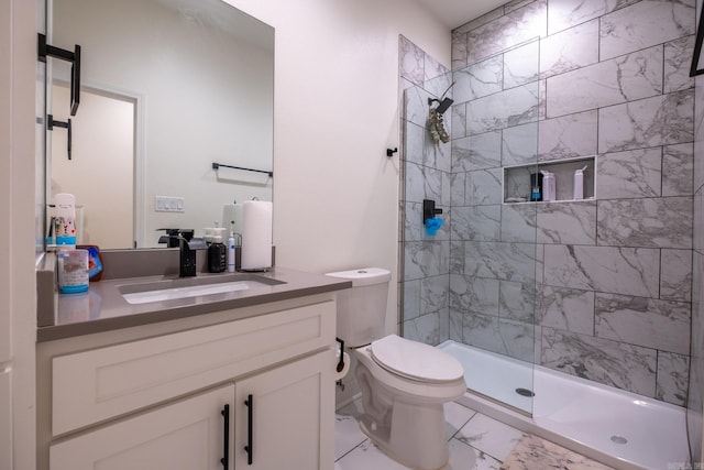 2103 Wolfe St, Little Rock, AR 72202 - bathroom with marble finish floors, vanity, toilet, and tiled shower