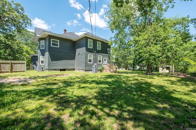 2103 Wolfe St, Little Rock, AR 72202 - back of house with a chimney