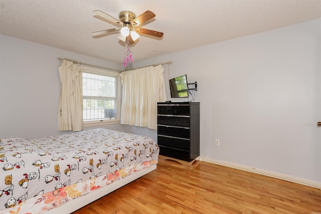 200 Sonnet St, Hot Springs, AR 71913 - bedroom featuring wood finished floors, a ceiling fan, and baseboards