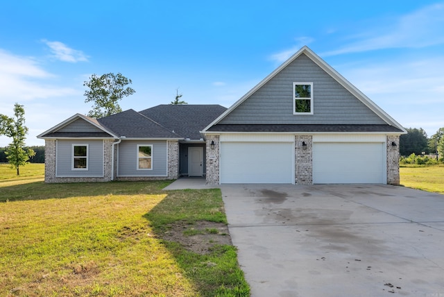 15987 E Miller Sardis Rd, Bauxite, AR 72011 - traditional-style house featuring a garage, brick siding, a front lawn, and driveway