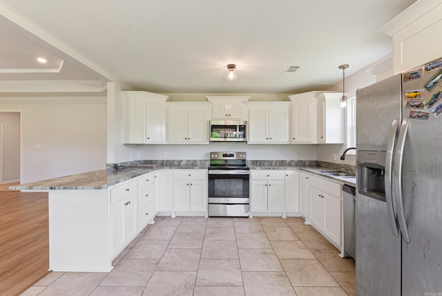 15987 E Miller Sardis Rd, Bauxite, AR 72011 - kitchen featuring appliances with stainless steel finishes, a sink, a peninsula, white cabinetry, and light stone counters