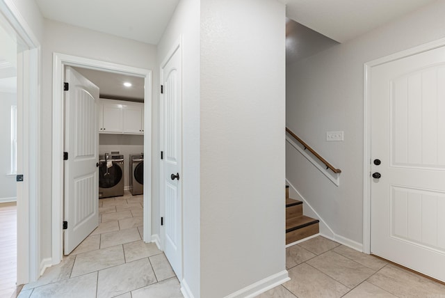 15987 E Miller Sardis Rd, Bauxite, AR 72011 - corridor with washer and clothes dryer, light tile patterned floors, stairway, and recessed lighting