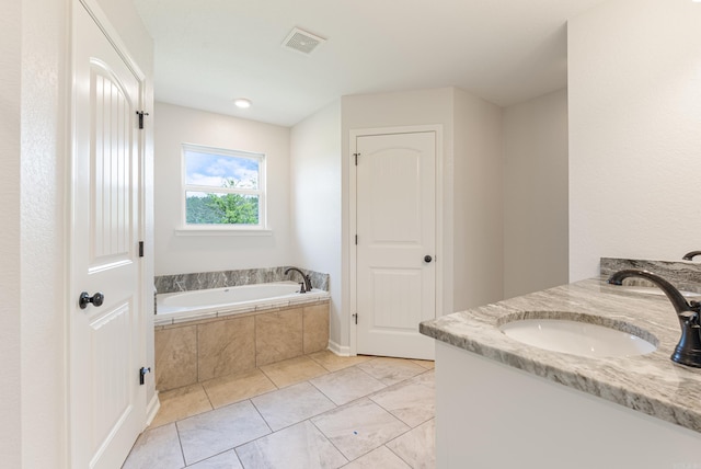 15987 E Miller Sardis Rd, Bauxite, AR 72011 - bathroom with double vanity, a garden tub, and tile patterned floors