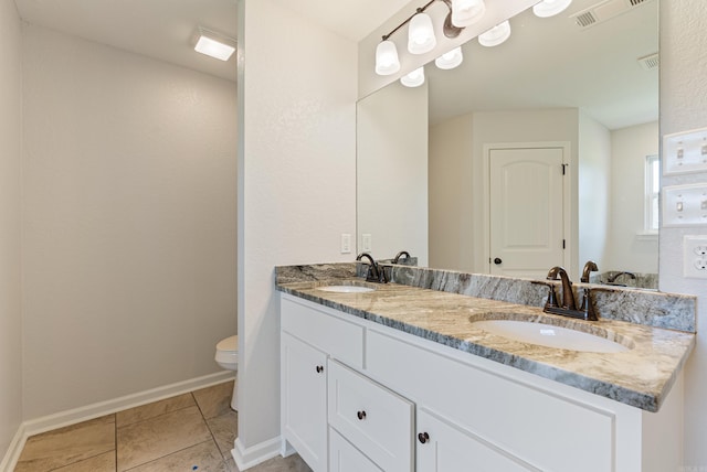 15987 E Miller Sardis Rd, Bauxite, AR 72011 - full bath with toilet, double vanity, baseboards, and tile patterned floors