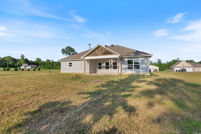 15987 E Miller Sardis Rd, Bauxite, AR 72011 - back of house featuring a lawn