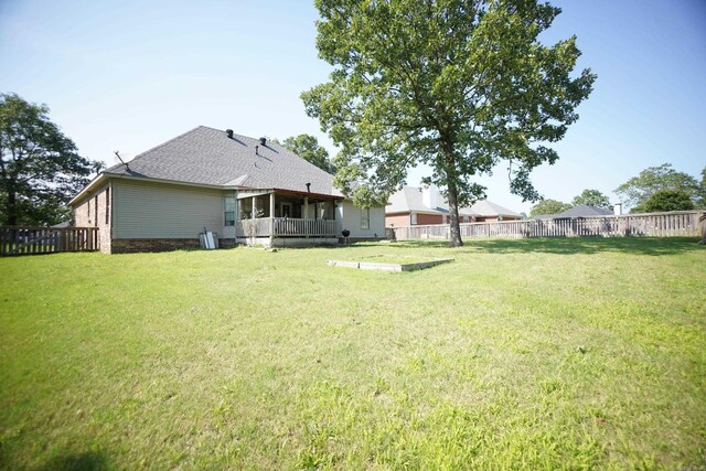 view of yard with a sunroom