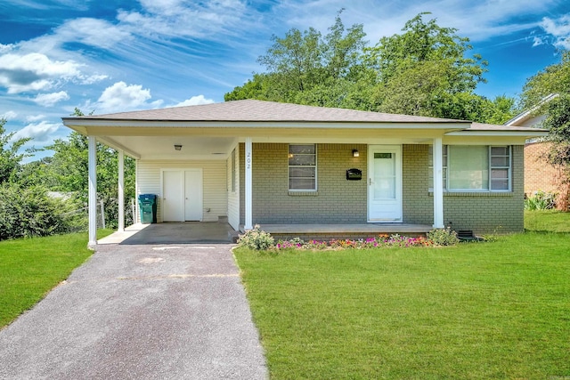 202 Gilbert Dr, Little Rock, AR 72205 - bungalow with driveway, brick siding, a front yard, and a carport