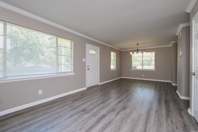 202 Gilbert Dr, Little Rock, AR 72205 - foyer featuring a chandelier, ornamental molding, dark wood-style flooring, and baseboards