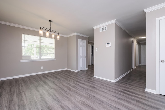 202 Gilbert Dr, Little Rock, AR 72205 - unfurnished room with ornamental molding, wood finished floors, and baseboards