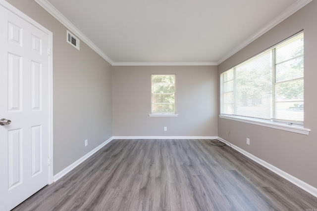 202 Gilbert Dr, Little Rock, AR 72205 - spare room featuring wood finished floors, ornamental molding, and baseboards