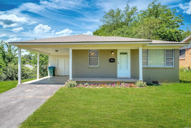 202 Gilbert Dr, Little Rock, AR 72205 - view of front of home featuring brick siding, a front lawn, covered porch, and an attached carport