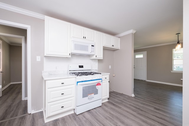 202 Gilbert Dr, Little Rock, AR 72205 - kitchen with white appliances, baseboards, light wood-style floors, light countertops, and crown molding
