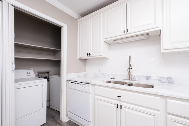 202 Gilbert Dr, Little Rock, AR 72205 - laundry area with washer / dryer, dark wood-style floors, and ornamental molding
