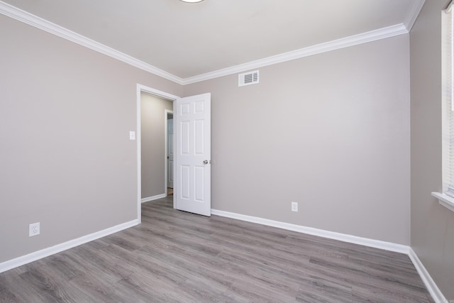 202 Gilbert Dr, Little Rock, AR 72205 - empty room featuring wood finished floors, ornamental molding, and baseboards