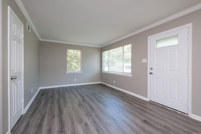 202 Gilbert Dr, Little Rock, AR 72205 - foyer entrance featuring dark wood finished floors, crown molding, and baseboards