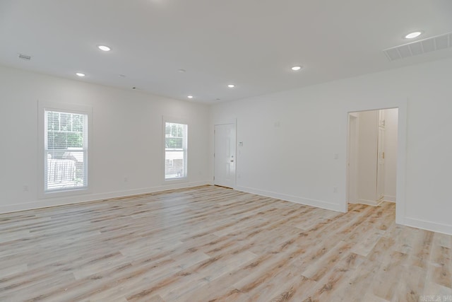 1500 S Church St, Jonesboro, AR 72401 - empty room with light wood-style floors, recessed lighting, and baseboards