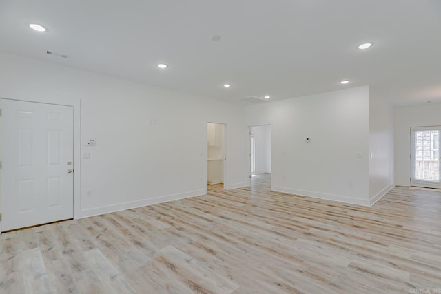 1500 S Church St, Jonesboro, AR 72401 - empty room with light wood-type flooring, baseboards, and recessed lighting