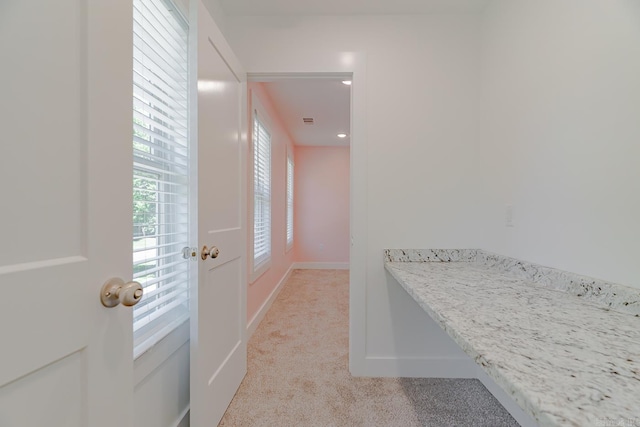 1500 S Church St, Jonesboro, AR 72401 - hallway with light carpet and baseboards