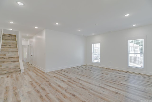 1500 S Church St, Jonesboro, AR 72401 - empty room featuring stairs, light wood-style flooring, recessed lighting, and baseboards