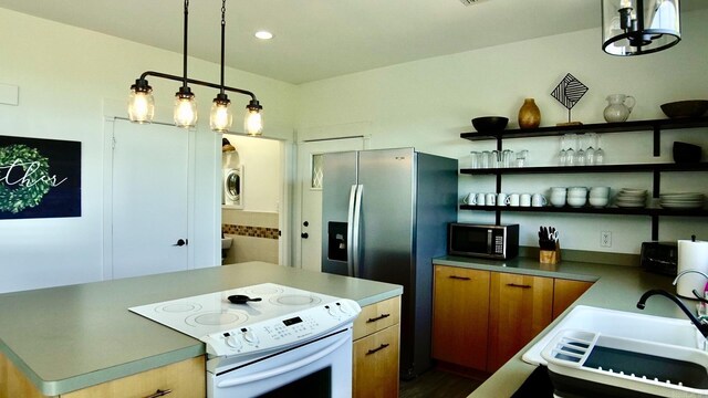 157 E Hawkview Pl, Royal, AR 71968 - kitchen with appliances with stainless steel finishes, a kitchen island, a sink, open shelves, and decorative light fixtures