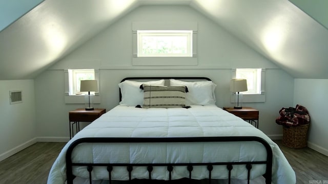 157 E Hawkview Pl, Royal, AR 71968 - bedroom with wood finished floors, multiple windows, baseboards, and lofted ceiling