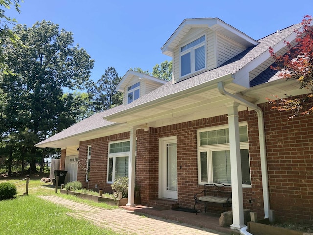 157 E Hawkview Pl, Royal, AR 71968 - entrance to property featuring brick siding and a shingled roof