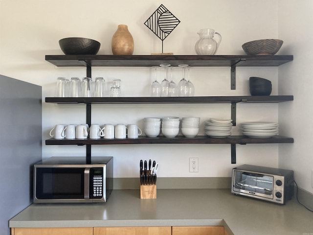 157 E Hawkview Pl, Royal, AR 71968 - kitchen view of stainless steel microwave and open shelves