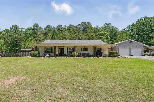 430 Avon Rd, De Queen, AR 71832 - ranch-style home with a garage, a carport, a porch, and driveway