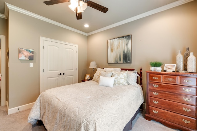 3891 Harrison Rd, Benton, AR 72019 - bedroom featuring light colored carpet, crown molding, a closet, baseboards, and a ceiling fan