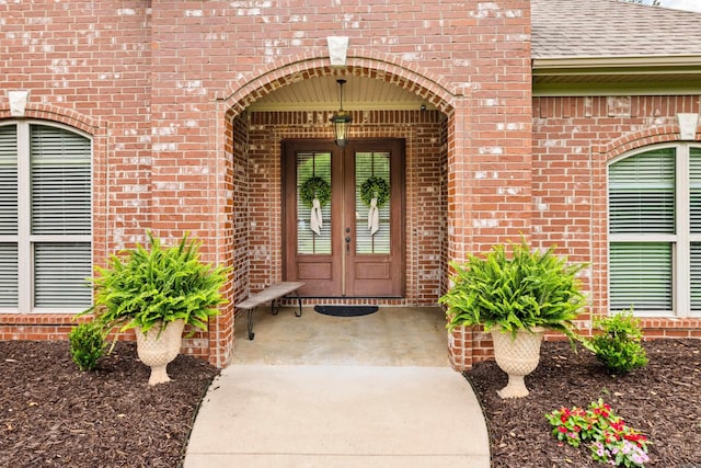 3891 Harrison Rd, Benton, AR 72019 - entrance to property featuring brick siding, french doors, and a shingled roof