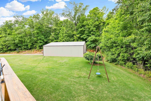 3891 Harrison Rd, Benton, AR 72019 - view of grassy yard with a pole building and an outbuilding
