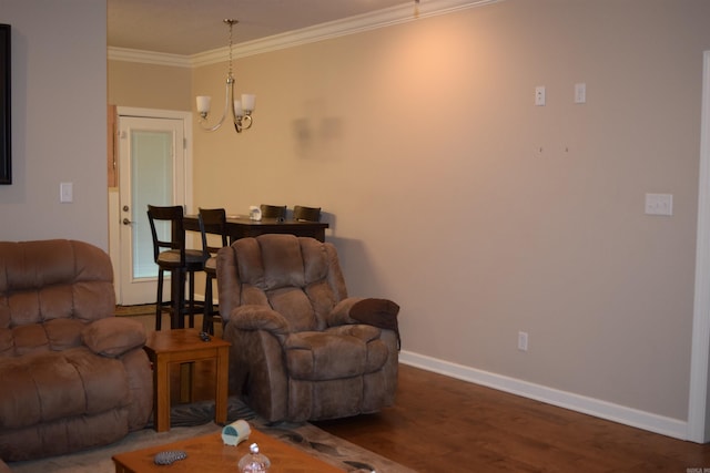 living area featuring a chandelier, baseboards, crown molding, and dark wood finished floors