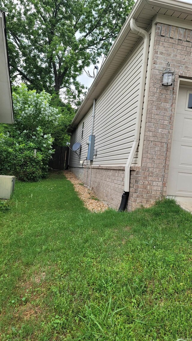 view of property exterior featuring a garage