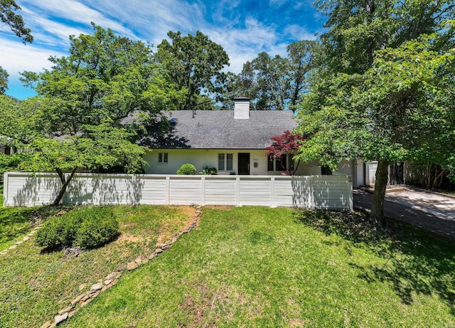 5412 S Grandview St, Little Rock, AR 72207 - rear view of house with a chimney