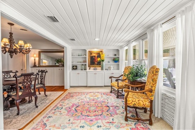 5412 S Grandview St, Little Rock, AR 72207 - living area featuring plenty of natural light, a chandelier, and built in features