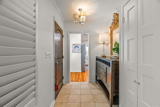 5412 S Grandview St, Little Rock, AR 72207 - entrance foyer with ornamental molding, a chandelier, and light tile patterned floors