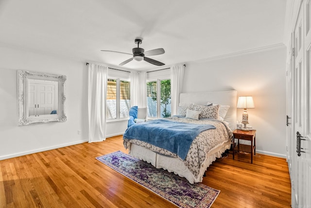 5412 S Grandview St, Little Rock, AR 72207 - bedroom featuring wood finished floors, baseboards, and ceiling fan
