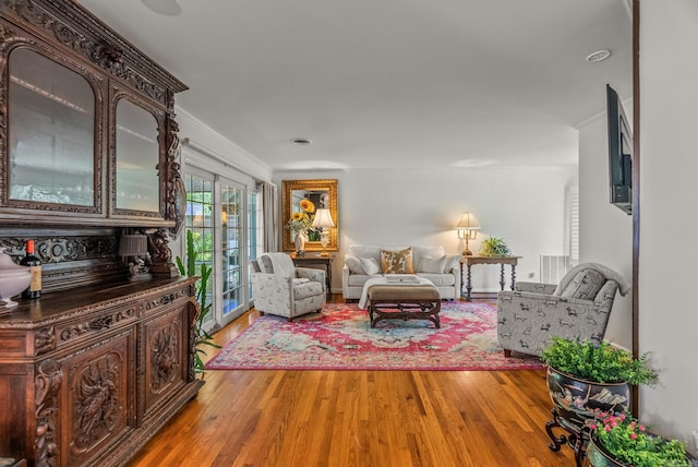 5412 S Grandview St, Little Rock, AR 72207 - living area featuring light wood finished floors and ornamental molding