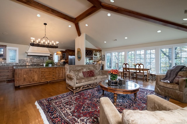 5313 N Grandview St, Little Rock, AR 72207 - living area with beam ceiling, dark wood-type flooring, high vaulted ceiling, a chandelier, and recessed lighting