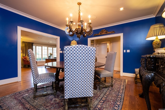 5313 N Grandview St, Little Rock, AR 72207 - dining area featuring a chandelier, crown molding, wood finished floors, baseboards, and recessed lighting
