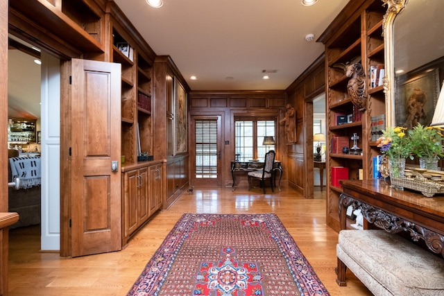5313 N Grandview St, Little Rock, AR 72207 - entryway featuring light wood finished floors, wooden walls, and recessed lighting
