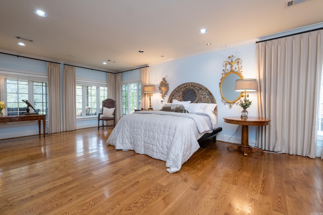 5313 N Grandview St, Little Rock, AR 72207 - bedroom featuring light wood finished floors, ornamental molding, recessed lighting, and baseboards