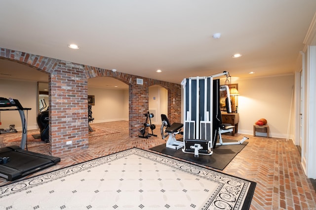 5313 N Grandview St, Little Rock, AR 72207 - exercise room with arched walkways, baseboards, brick flooring, ornamental molding, and recessed lighting